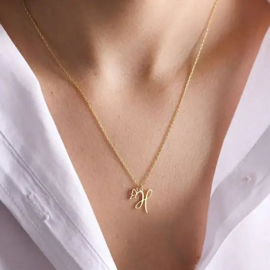 Shop our extensive, custom-made personalized initial necklaces, bracelets and rings in stunning 18 carat gold. Whether you’re treating yourself or hunting for a unique, priceless and luxurious anniversary or birthday gift, our gold jewelry collections allow you to wonderfully express what's in your heart. Handcrafted in Dubai, United Arab Emirates.