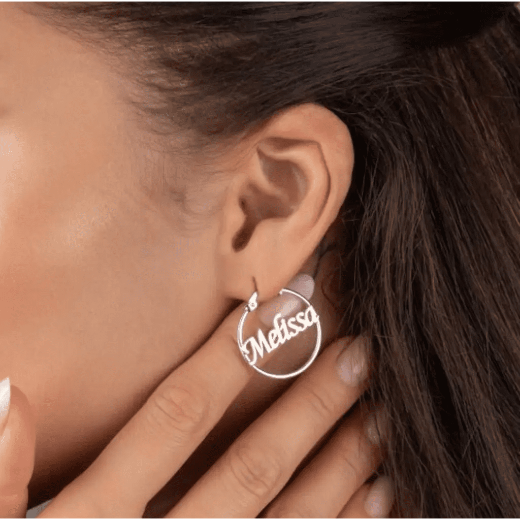 Hoop name earrings made in real gold. Designed and handcrafted in the UAE. These gorgeous elegant earrings are locally handcrafted with the highest quality materials and artisans available in Dubai.