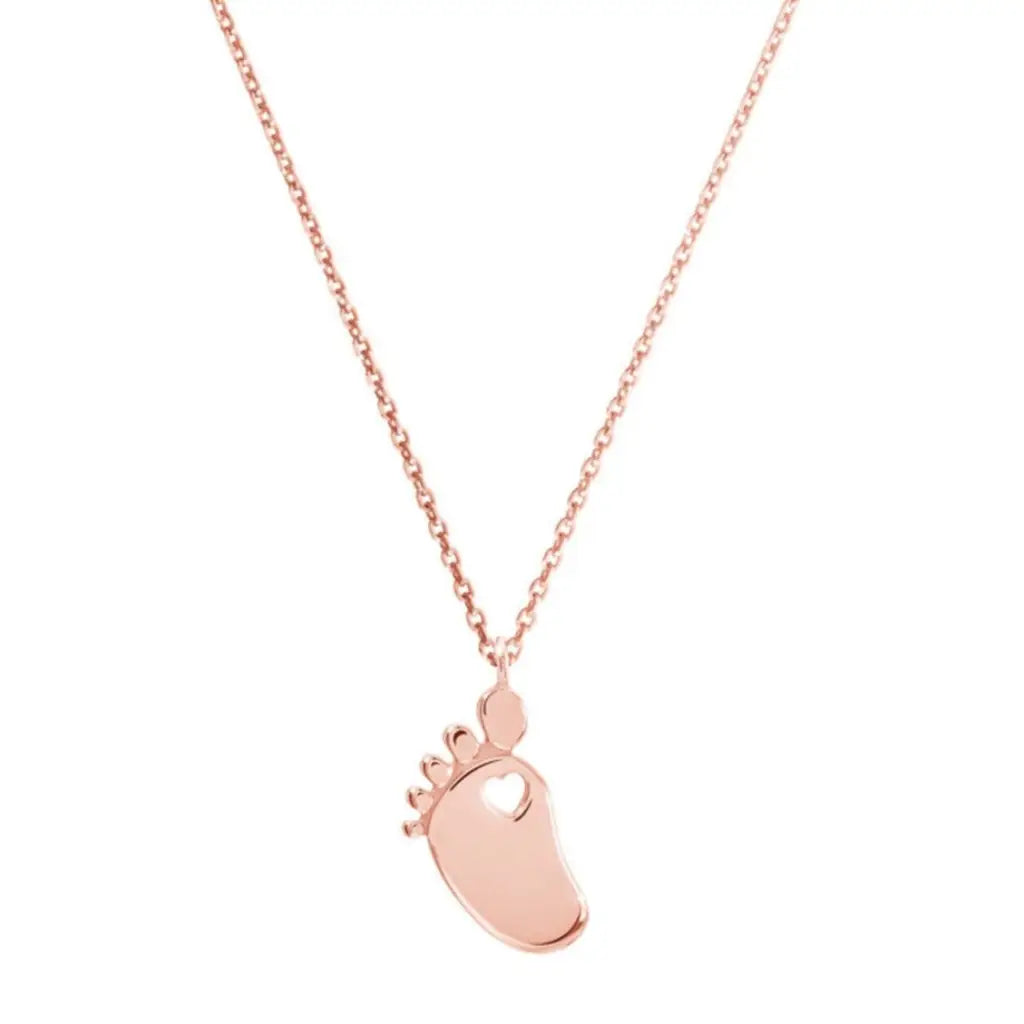 Personalized Baby Feet Necklace Designed and handcrafted in the UAE.