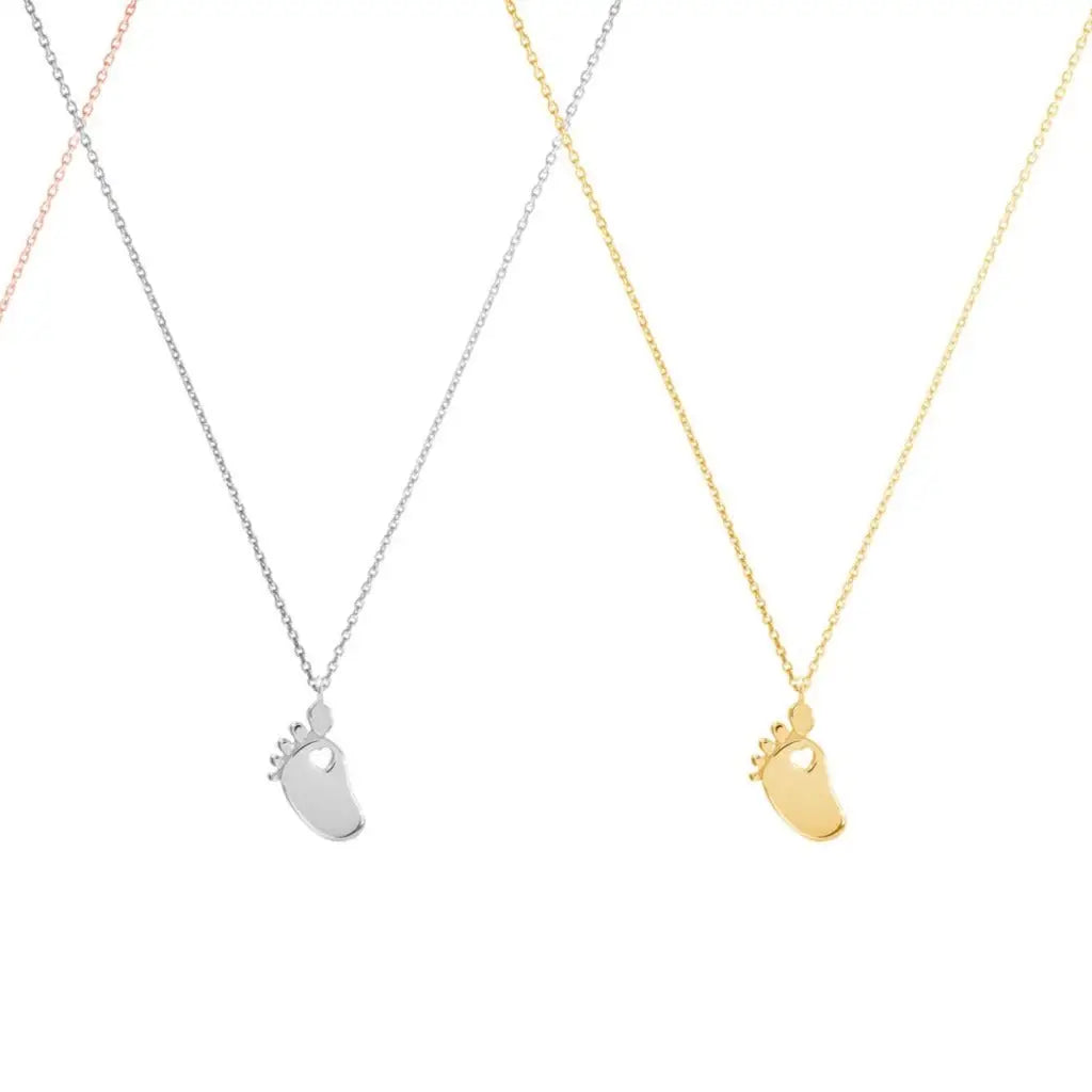 Personalized Baby Feet Necklace Designed and handcrafted in the UAE.