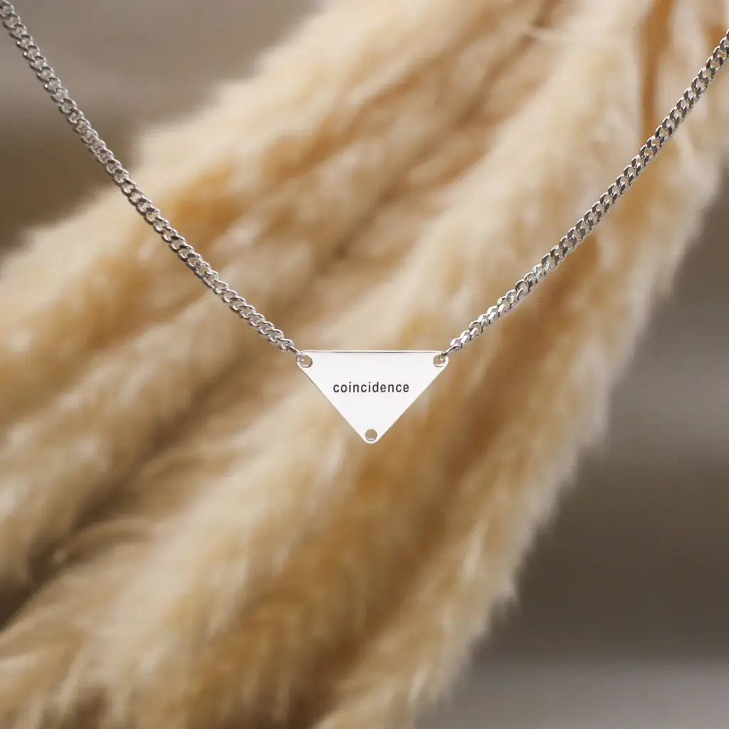 Luxury Gold Pyramid-shaped Name Necklace for him made of genuine 18k solid gold and personalized with the letters/numbers of your choice. A thoughtful luxury anniversary gift for your boyfriend or husband, and the perfect expensive birthday gift for a father or a brother.