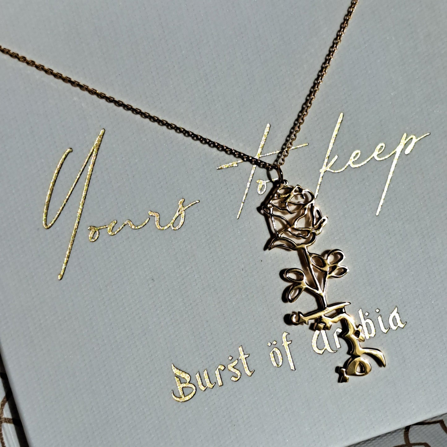 Birth flower name necklace, designed in 18 carat gold in Dubai, UAE