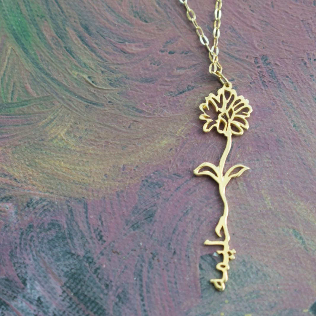 Birth flower name necklace, designed in 18 carat gold in Dubai, UAE
