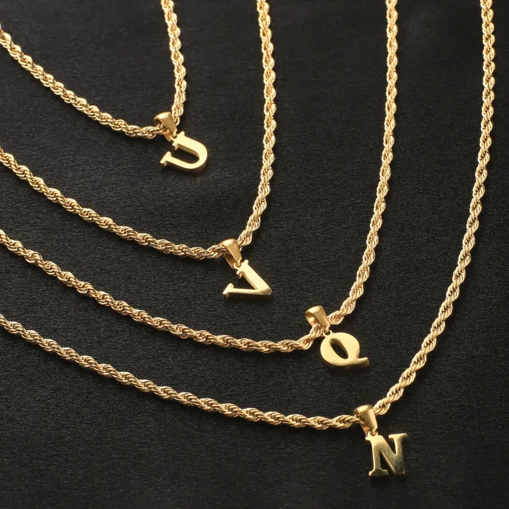 Luxury Rope Chain Initial Necklace made of genuine 18k solid gold and personalized with the letters/numbers of your choice. A thoughtful luxury anniversary gift for your boyfriend or husband, and the perfect expensive birthday gift for a father or a brother.