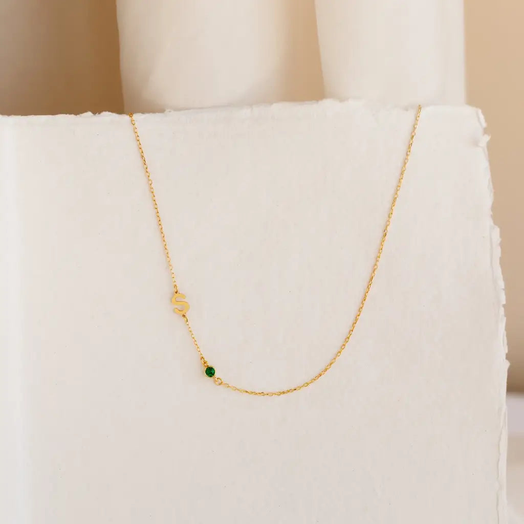 Gold sideways letter necklace - made in real solid gold. The perfect gift for your loved ones and is also great for layering with other necklaces or minimalist wear. Can be personalized in Arabic or English. Crafted to the highest standards and is made at our jewelry workshop in Dubai at the United Arab Emirates.
