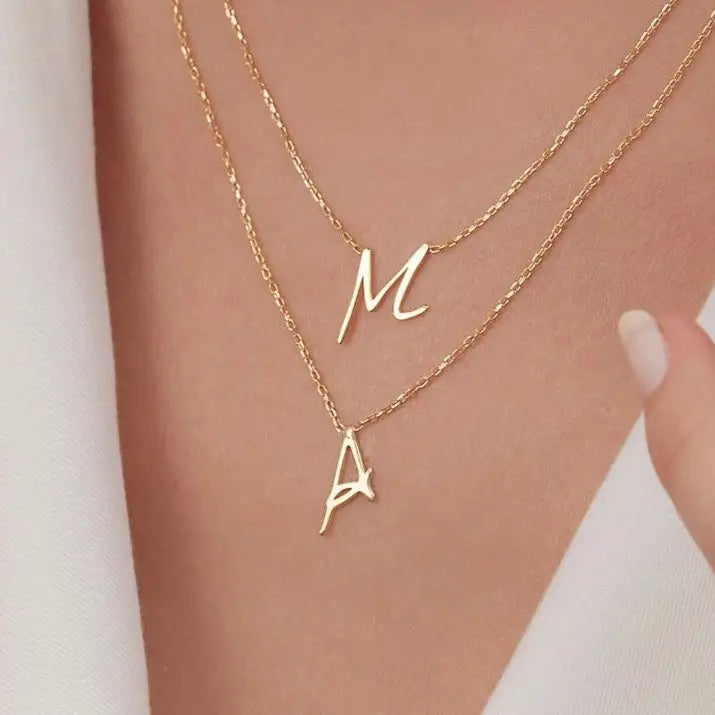 Gold Single Letter Initial Necklace Personalized, designed and handcrafted in the UAE. Delivers within 2 to 5 business days. This fine and minimal single initial necklace is locally handcrafted with the highest quality materials and artisans available in Dubai.