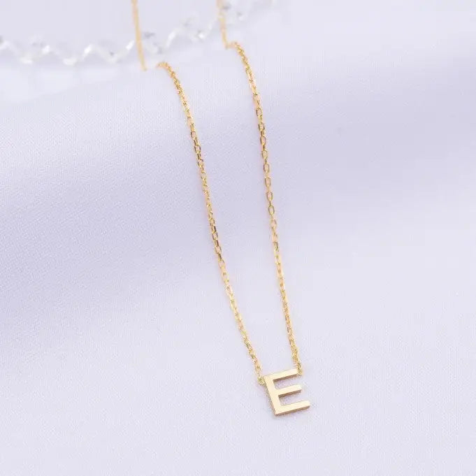 Gold Single Letter Initial Necklace Personalized, designed and handcrafted in the UAE. Delivers within 2 to 5 business days. This fine and minimal single initial necklace is locally handcrafted with the highest quality materials and artisans available in Dubai.