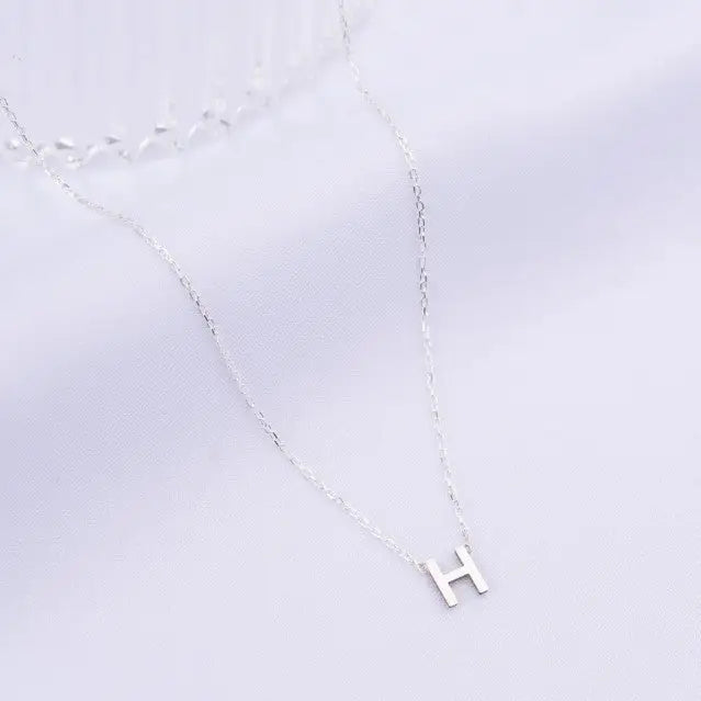 Gold Single Letter Initial Necklace Personalized, designed and handcrafted in the UAE. Delivers within 2 to 5 business days. This fine and minimal single initial necklace is locally handcrafted with the highest quality materials and artisans available in Dubai.