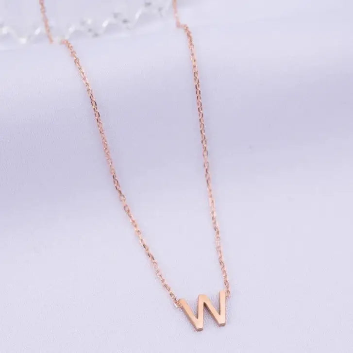 Gold Single Letter Initial Necklace Personalized, designed and handcrafted in the UAE. Delivers within 2 to 5 business days. This fine and minimal single initial necklace is locally handcrafted with the highest quality materials and artisans available in Dubai.