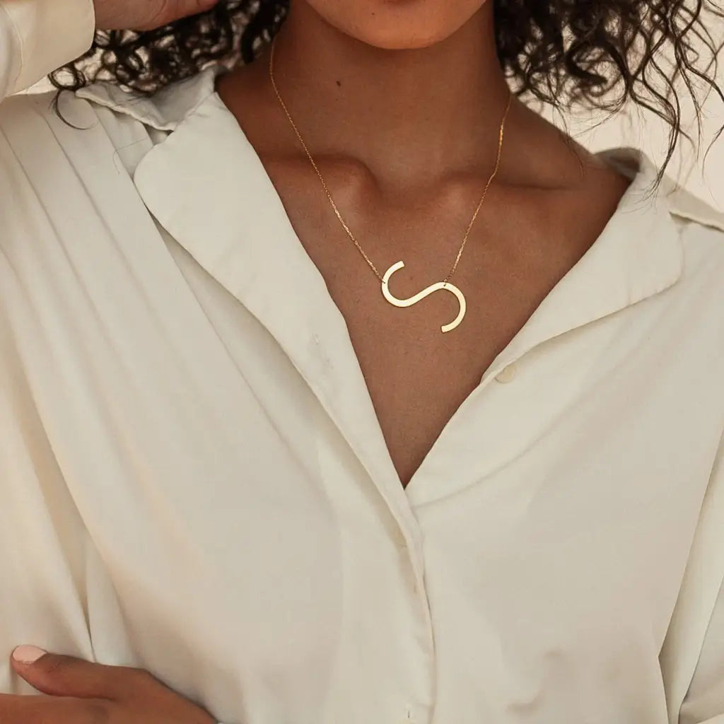 This big letter gold initial necklace is locally handcrafted with the highest quality materials and artisans available in Dubai. Great addition to your collection or perfect gift for a loved one.