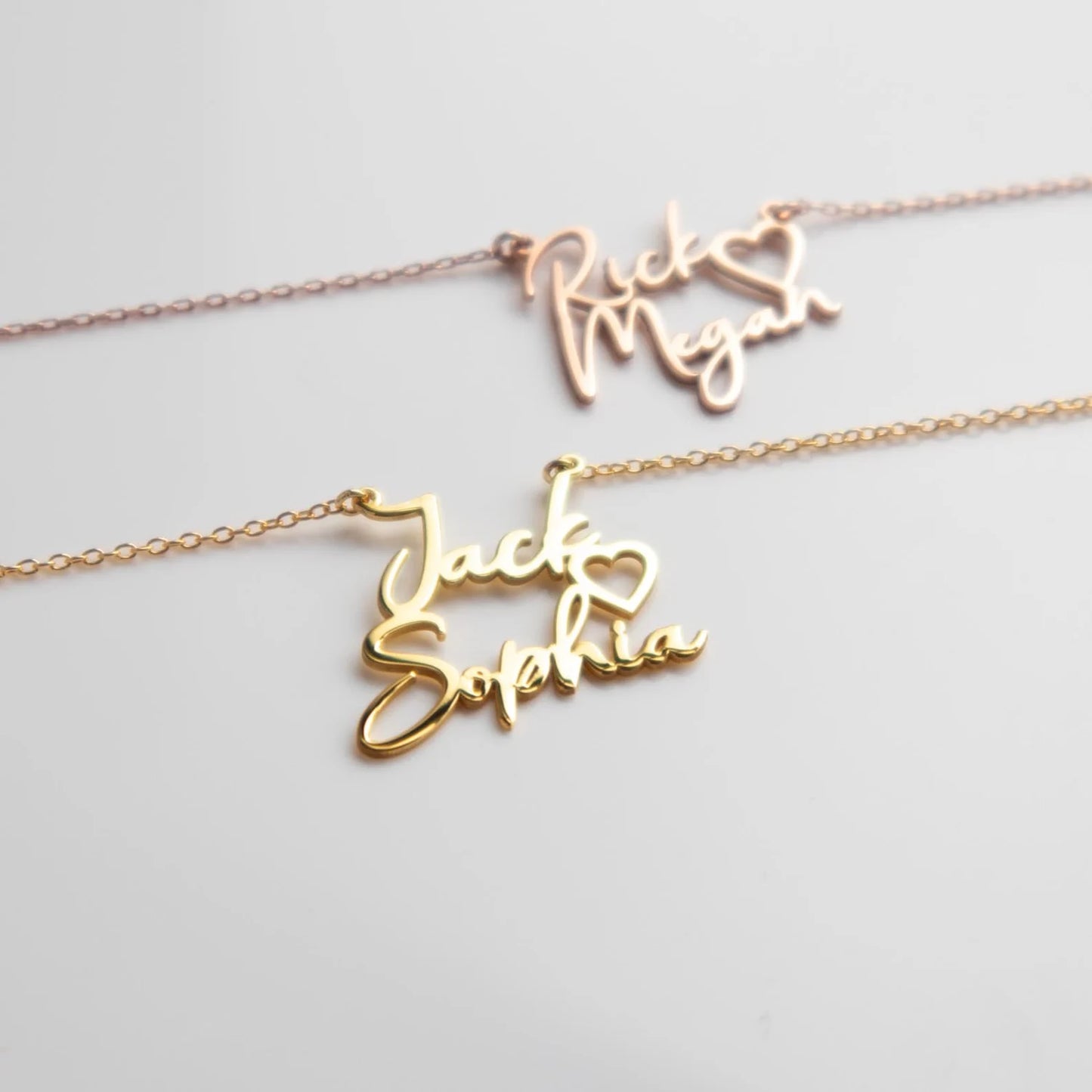 "Gold Two Names Necklace - A symbol of personalized elegance by Burst of Arabia. Crafted with precision, this exquisite piece adds a touch of individuality to your style. Order now for a uniquely cherished accessory."