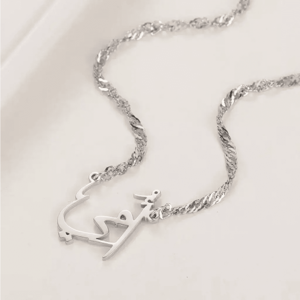Everyone loves their mother, so here is your opportunity to show her how much you love her. This beautiful gold pendant with the word "Mother" made of real gold is just what every mother would love to receive. Handcrafted in the United Arab Emirates.