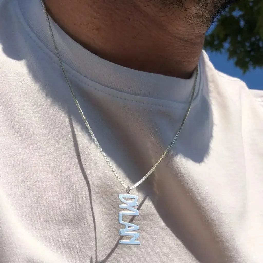 Gold Vertical Necklace for Men - A thoughtful luxury anniversary gift for your boyfriend or husband, and the perfect expensive birthday gift for a father or a brother.