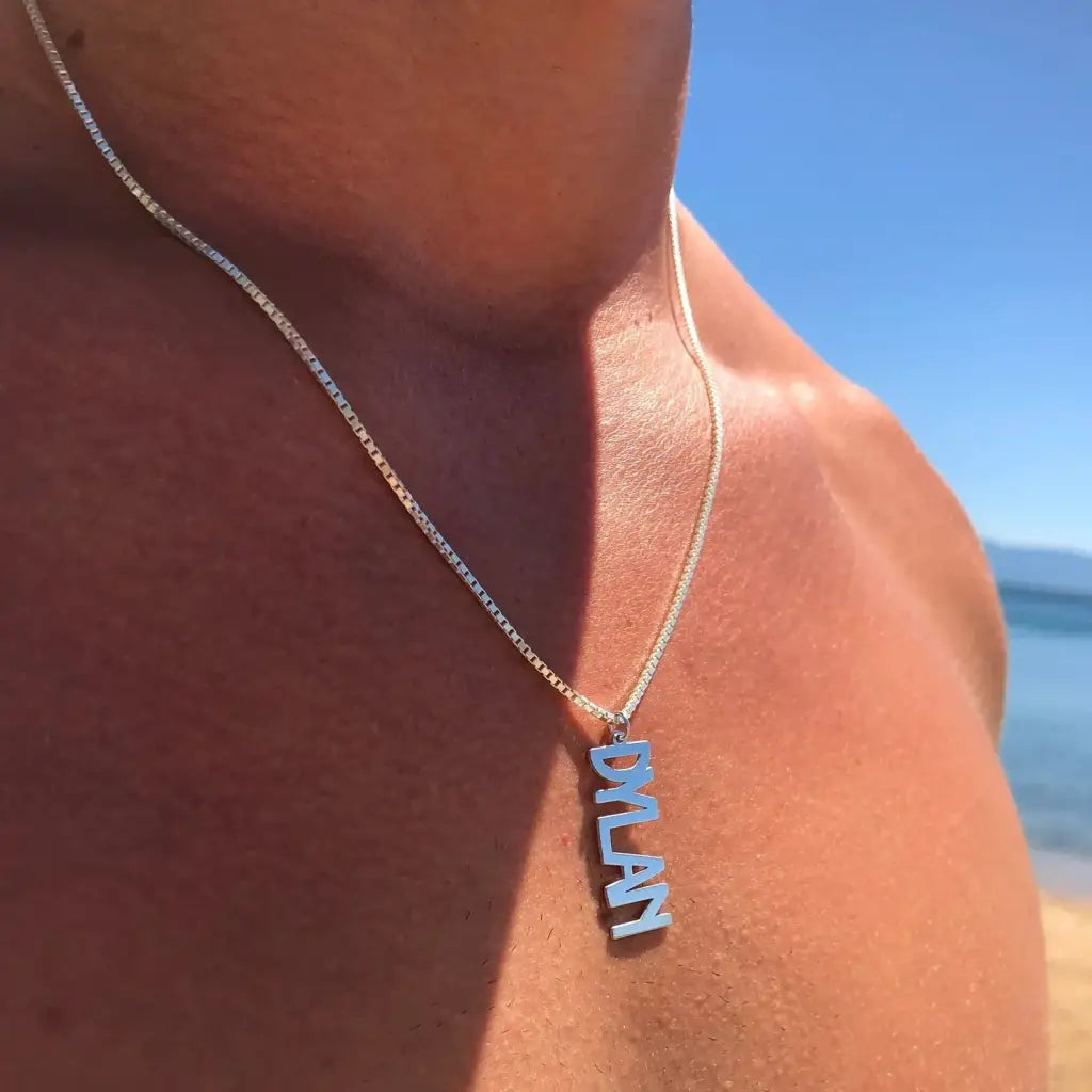 Gold Vertical Necklace for Men - A thoughtful luxury anniversary gift for your boyfriend or husband, and the perfect expensive birthday gift for a father or a brother.