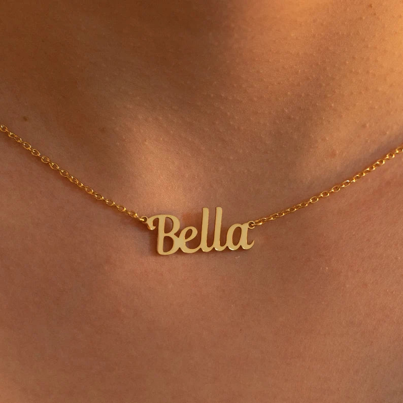 Gold Personalized Name Necklace Designed and handcrafted in the UAE. This classic gold name necklace is locally handcrafted with the highest quality materials and artisans available in Dubai. Perfect gift for a best friend, lover and family.