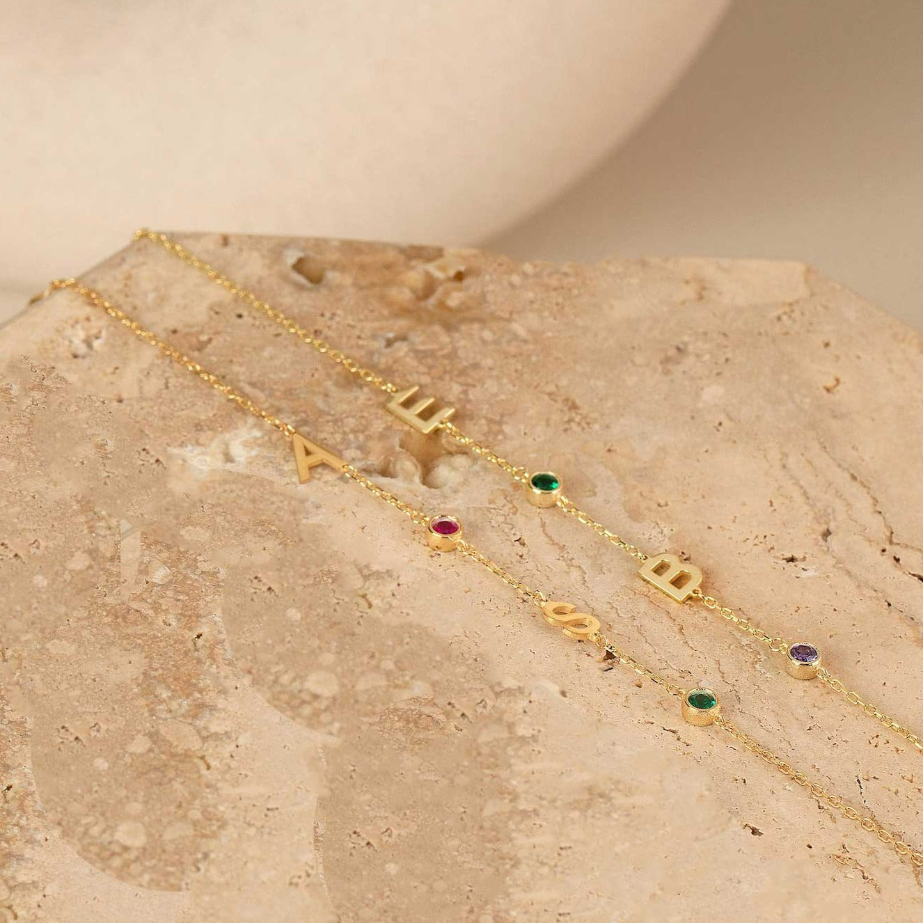 Two initial letter birthstone bracelet, anniversary gift for women, birthday gift for her. Handcrafted in Dubai, UAE.