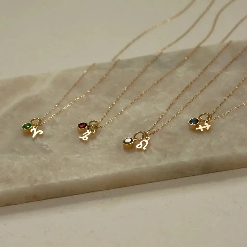 Gold Zodiac Horoscope Birthstone Necklace Designed and handcrafted in the UAE.