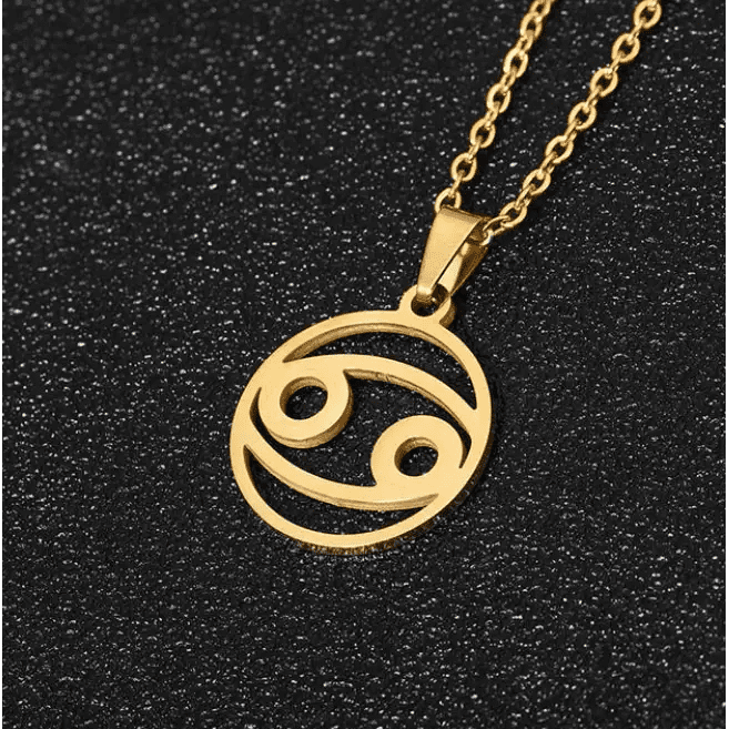 Cancer 18K gold zodiac horoscope necklace for men. A thoughtful luxury anniversary gift for your boyfriend or husband, and the perfect expensive birthday gift for a father or a brother.