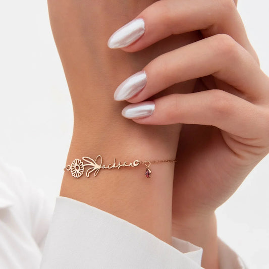 Personalized birth flower and butterfly jewelry – the best gifts for mom, featuring custom gold necklaces and bracelets handmade with love in the UAE.