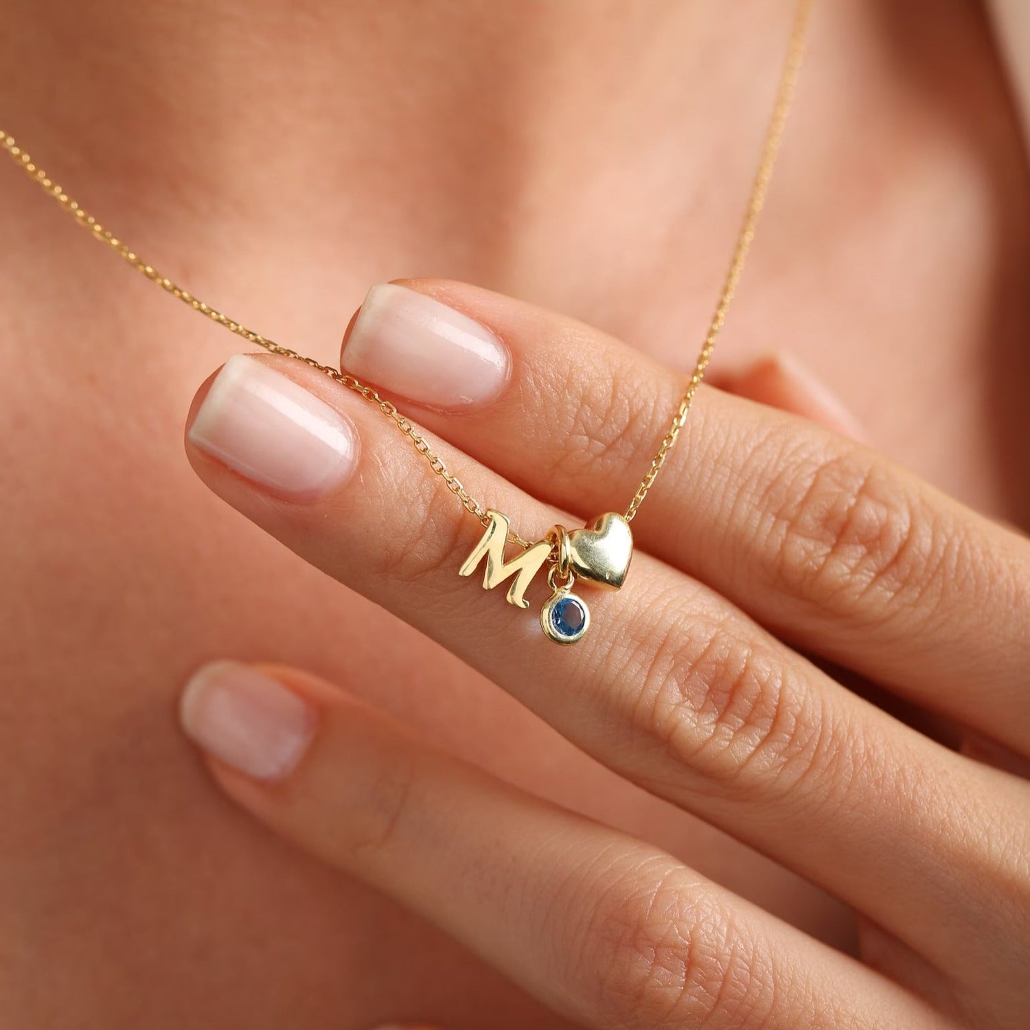 18 carat gold necklace for women - initial, heart and birthstone chain for her. Shop the finest birthday gifts for women in the UAE.