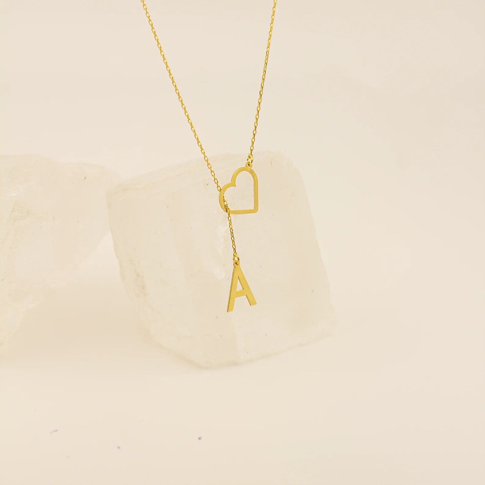 Make every letter count with our Dangle Letter Necklace with Heart. A timeless gift for her – shop now!