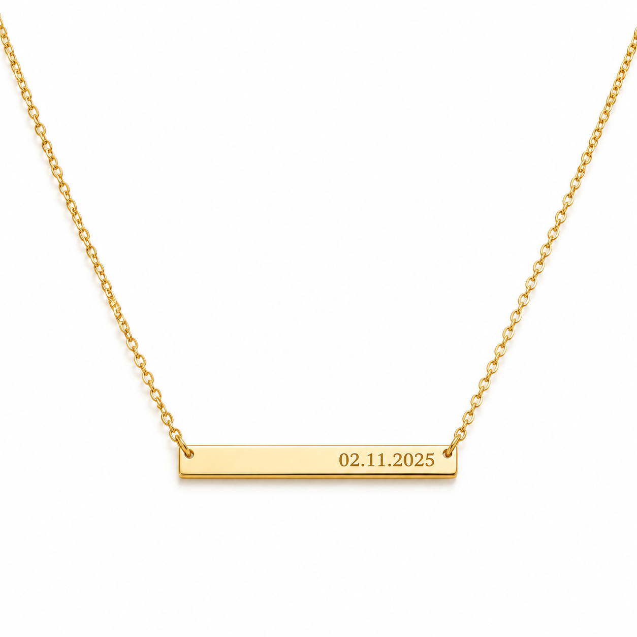 A gold bar necklace with a delicate cable chain, featuring a horizontal rectangular pendant engraved with the date '02.11.