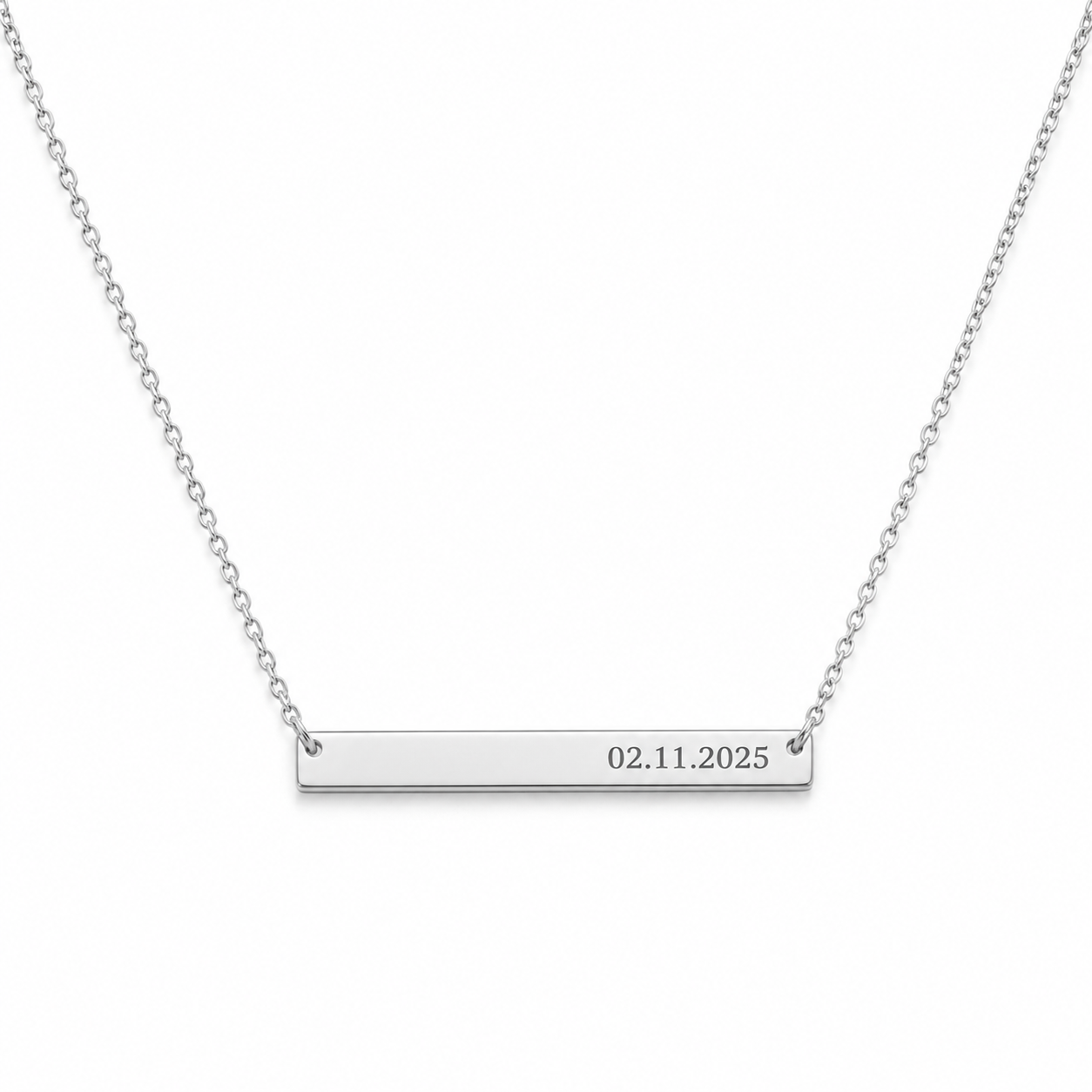 A white gold bar necklace with a delicate chain, featuring a horizontal bar engraved with the date '02.11.