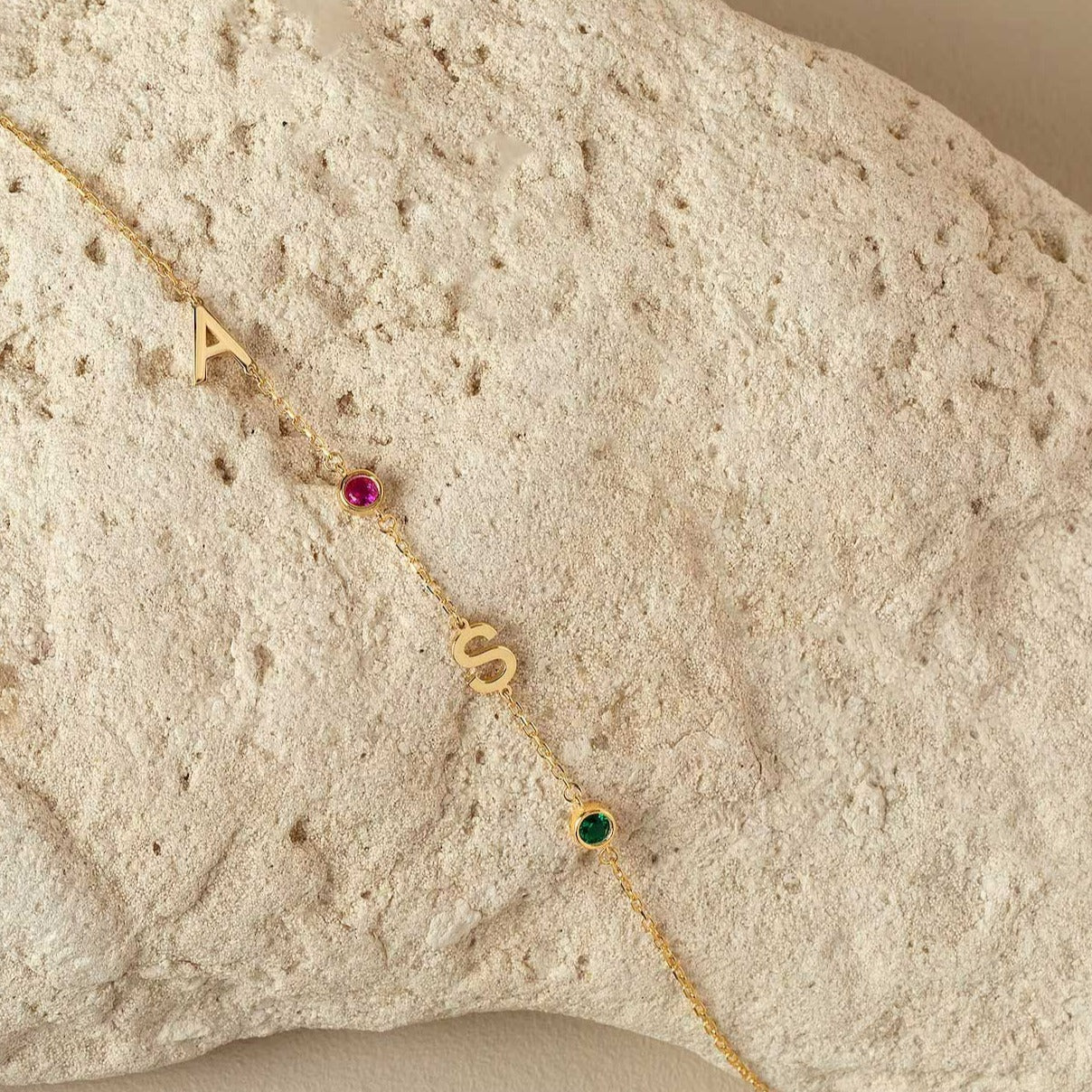 Two initial letter birthstone bracelet, anniversary gift for women, birthday gift for her. Handcrafted in Dubai, UAE.