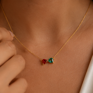 Celebrate your story with the Lovers Birthstone Necklace in solid 18K gold. Personalised with two heart-cut birthstones for a meaningful gift.