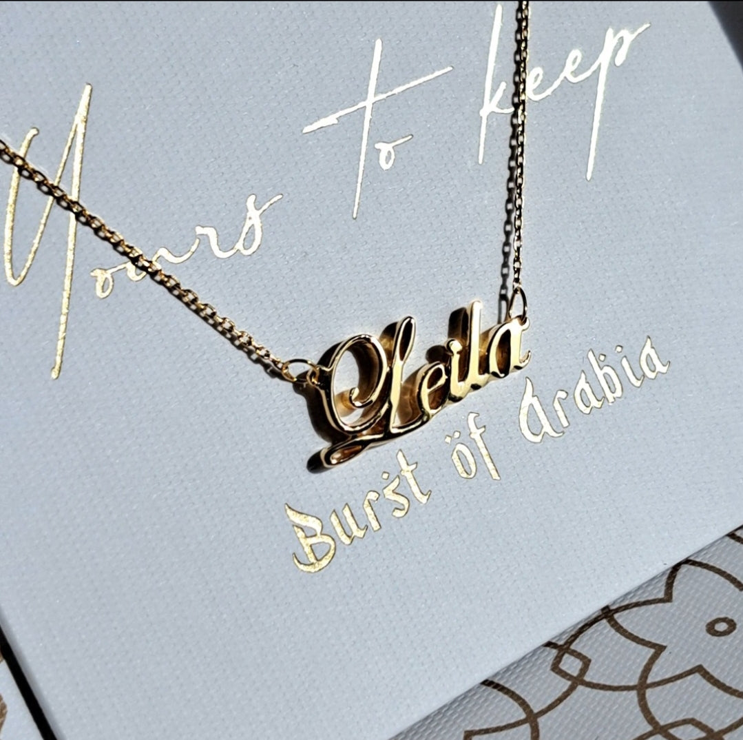 Alphabet name necklace, designed in Dubai with 18 carat gold, available in three colors: yellow gold, white gold, rose gold.