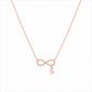 A delicate rose gold necklace featuring an infinity symbol pendant with a small dangling letter 'S', shown against a plain white background.