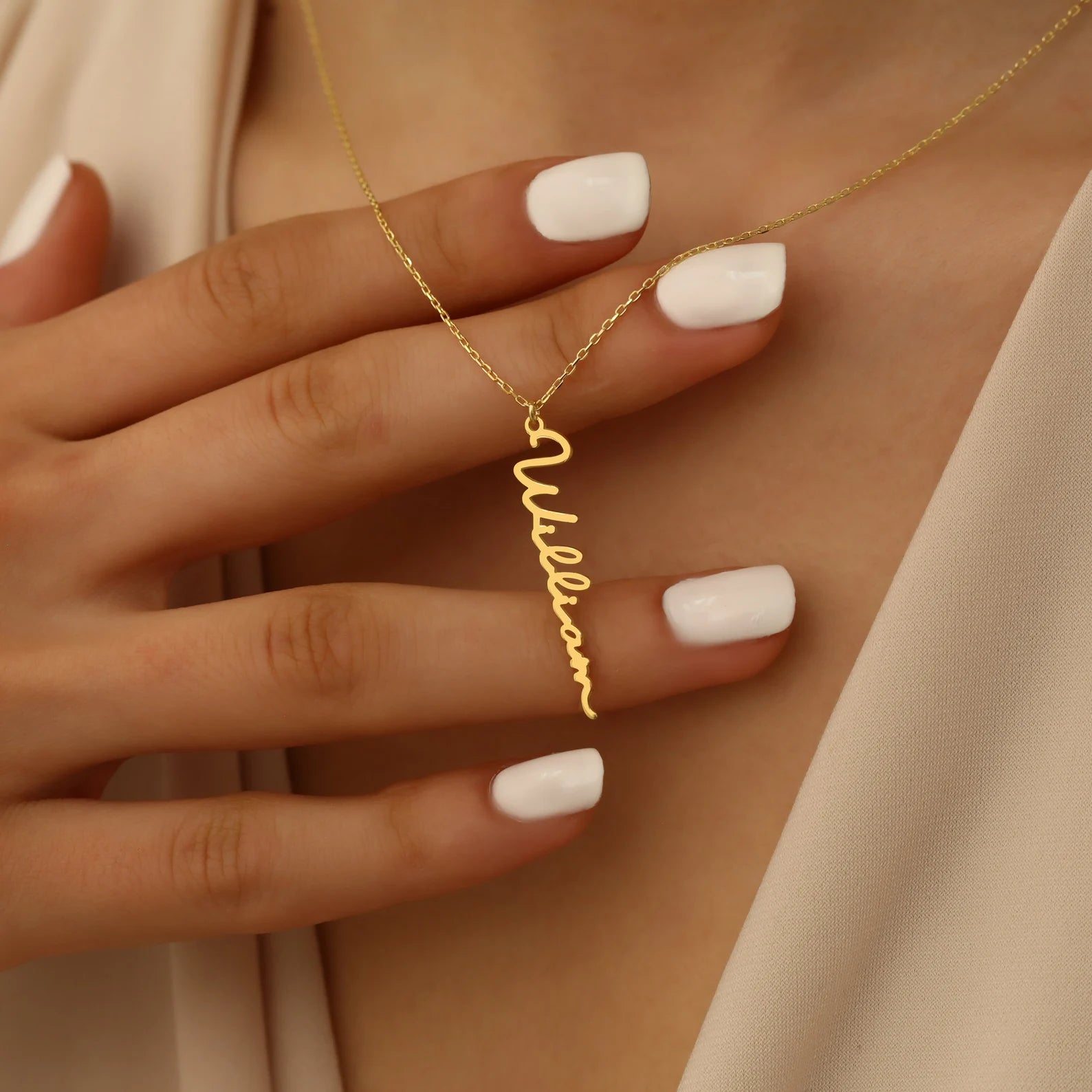 Handcrafted in the UAE, the Vertical Name Necklace is the perfect personalized gift – Order yours!