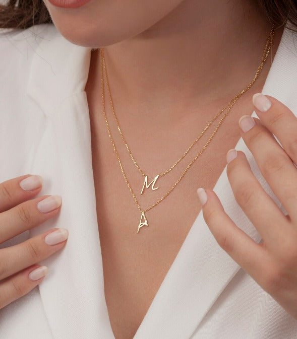 Gold Single Letter Initial Necklace Personalized, designed and handcrafted in the UAE. Delivers within 2 to 5 business days. This fine and minimal single initial necklace is locally handcrafted with the highest quality materials and artisans available in Dubai.