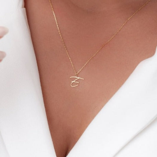 Gold Single Letter Initial Necklace Personalized, designed and handcrafted in the UAE. Delivers within 2 to 5 business days. This fine and minimal single initial necklace is locally handcrafted with the highest quality materials and artisans available in Dubai.