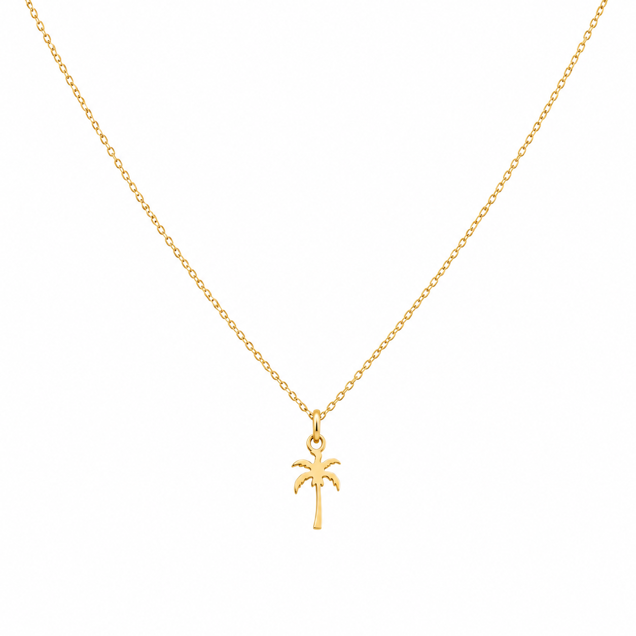 A delicate gold chain necklace featuring a small palm tree pendant in 18 carat gold, displayed against a solid white background.