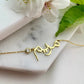 Simple yet eye-catching, this gold Arabic name necklace with birthstone is a stylish look anyone will appreciate. Our Name Necklace is a great piece that follows the fashion trend! Its fine curves and magnificent lettering make it a truly enjoyable necklace for you and your loved ones. Made in Dubai, UAE.