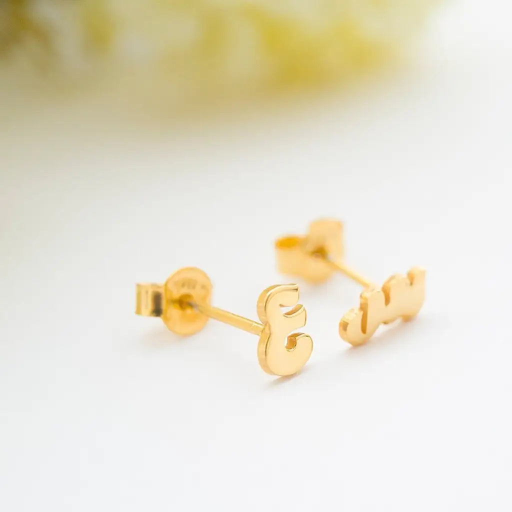 A simple and elegant design, adaptable to any style, and perfect to wear on any occasion, these Arabic initial earrings are available in 18K white, yellow, and rose gold. The perfect gift for a loved one. Beautifully handmade to the highest standards in the United Arab Emirates.