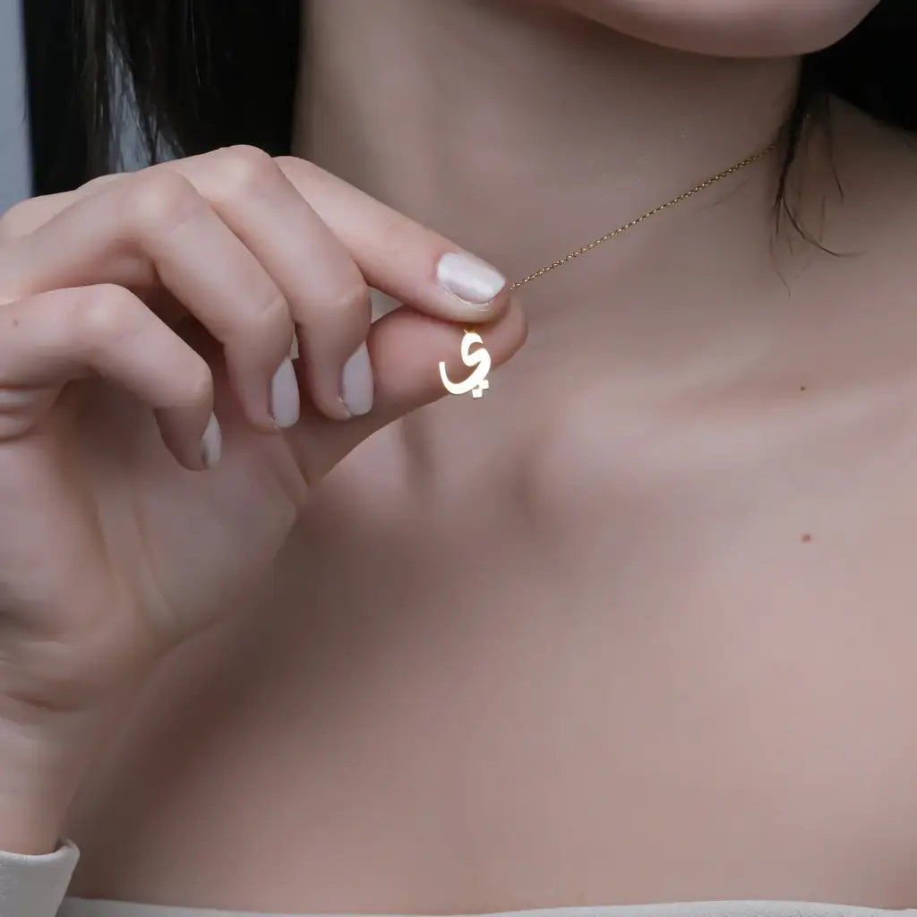 This personalized gold classic initial necklace is an ideal piece of customized jewelry that makes oneself stand out. It's also a thoughtful gift for the loved ones. Designed and handcrafted in Dubai, at the United Arab Emirates.