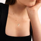18K Gold Baby Feet Birthstone Necklace Designed and handcrafted in the UAE.
