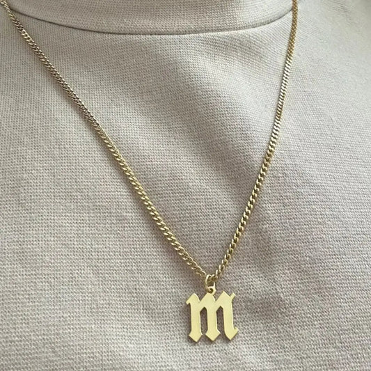 Luxury gold alphabet pendant made of genuine 18k solid gold and personalized with the initials of your choice. A thoughtful luxury anniversary gift for your boyfriend or husband, and the perfect expensive birthday gift for a father or a brother.