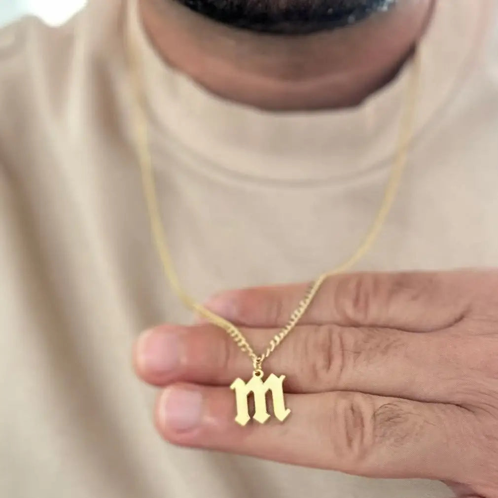 Luxury gold alphabet pendant made of genuine 18k solid gold and personalized with the initials of your choice. A thoughtful luxury anniversary gift for your boyfriend or husband, and the perfect expensive birthday gift for a father or a brother.