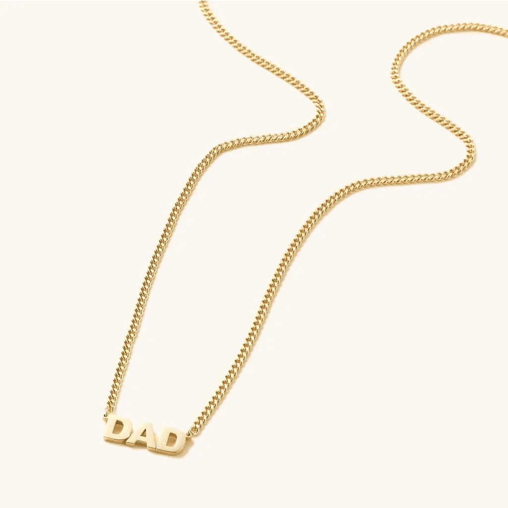 Luxury Gold Custom Name Necklace for men made of genuine 18k solid gold and personalized with the words of your choice. A thoughtful luxury anniversary gift for your boyfriend or husband, and the perfect expensive birthday gift for a father or a brother.