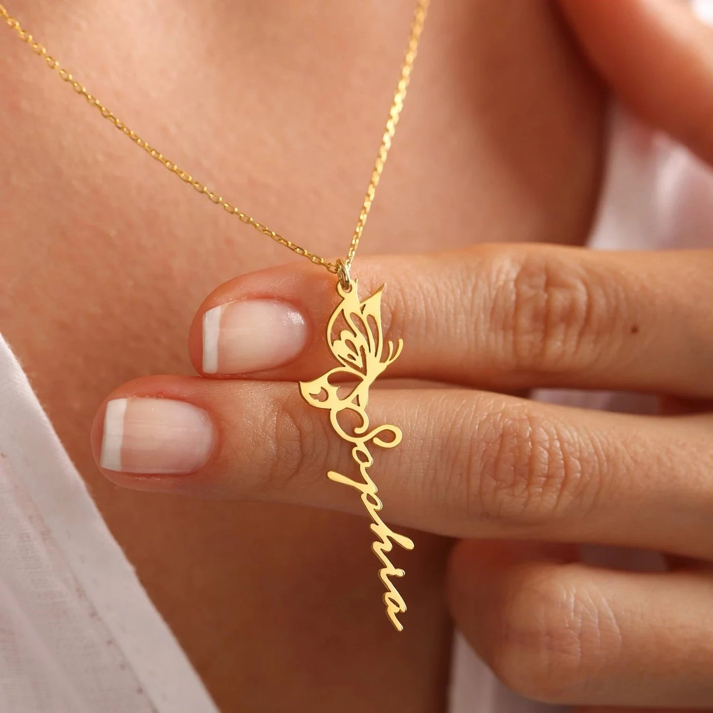 18K Gold Name Butterfly Necklace Designed and handcrafted in the UAE.