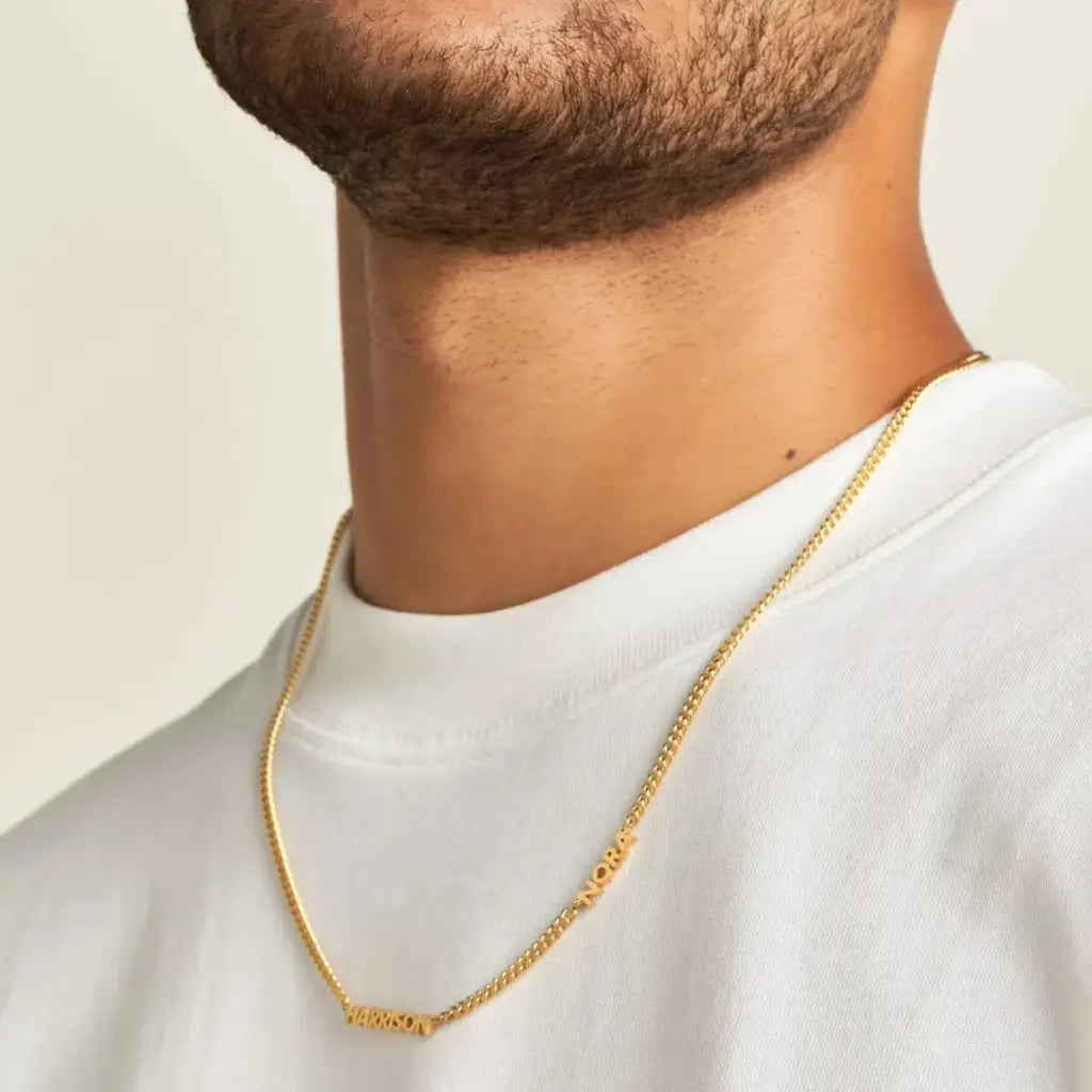 Luxury gold double name necklace made of genuine 18k solid gold and personalized with the names/words of your choice. A thoughtful luxury anniversary gift for your boyfriend or husband, and the perfect expensive birthday gift for a father or a brother.