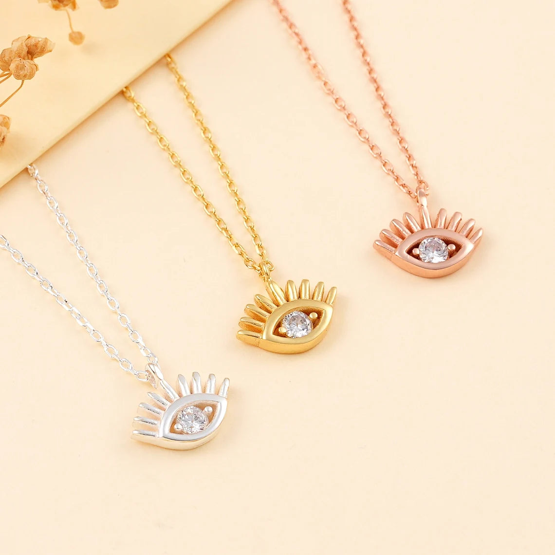 18 Carat Gold Tiny Evil Eye Necklace - Stylish Protection with Cultural Significance