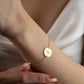 Initial letter birthstone bracelet, anniversary gift for women, birthday gift for her. Handcrafted in Dubai, UAE.