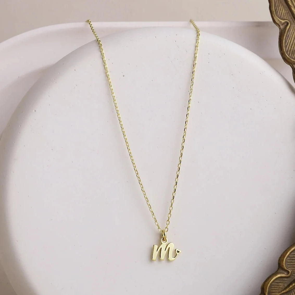 tiny-gold-letter-necklace-image