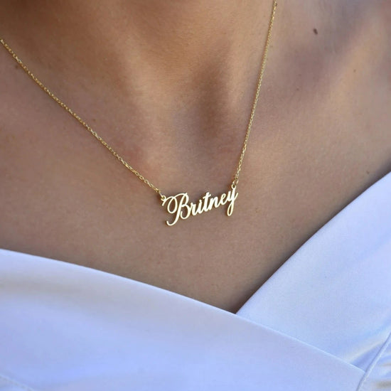 Gold Personalized Name Necklace Designed and handcrafted in the UAE. This classic gold name necklace is locally handcrafted with the highest quality materials and artisans available in Dubai. Perfect gift for a best friend, lover and family.