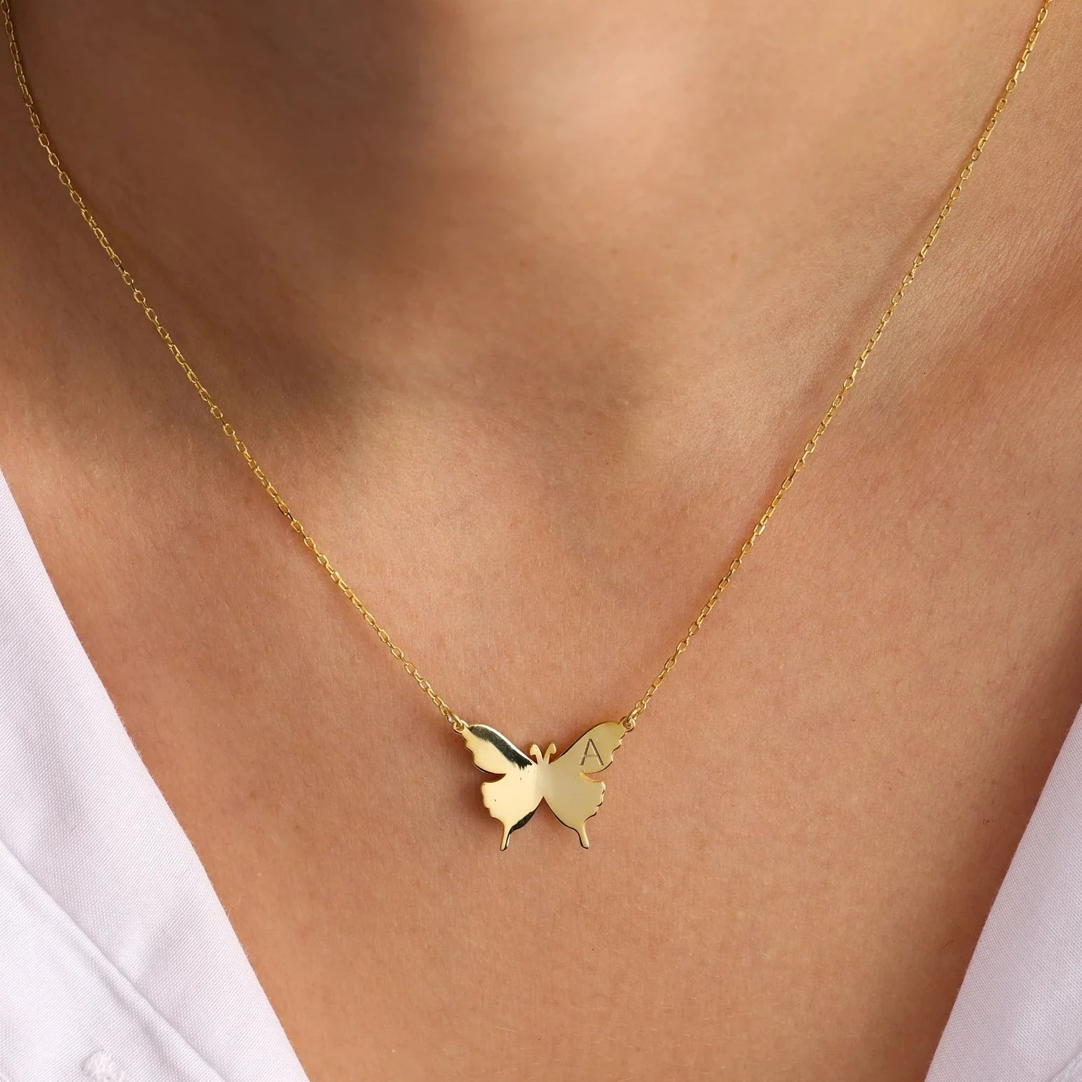 Gold initial necklace for wife, handcrafted in Dubai. Minimalist jewelry, luxury birthday gift for wife. Delivery across the UAE.