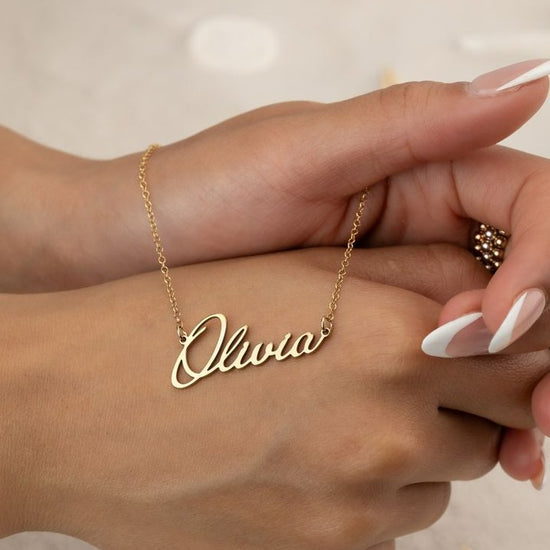 Gold name necklace - A personalised gift for wife. Handcrafted in Dubai, United Arab Emirates.